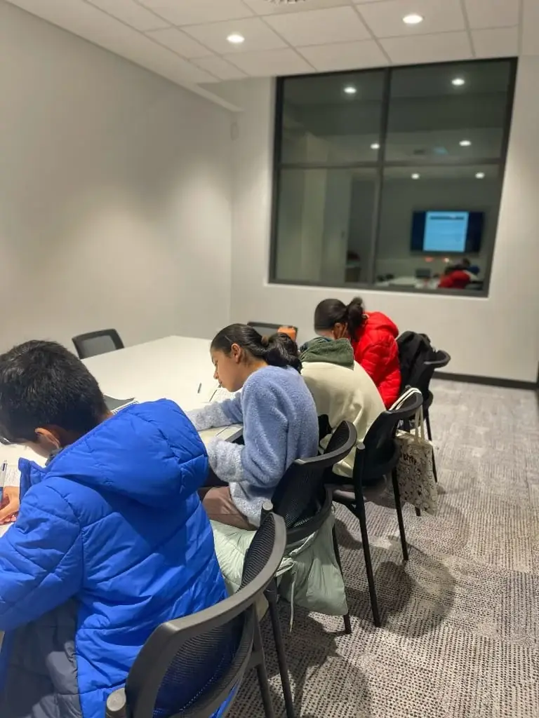 AKademy38 Academic Programs and Pricing AKademy38 students collaborating and studying curriculum in small group setting